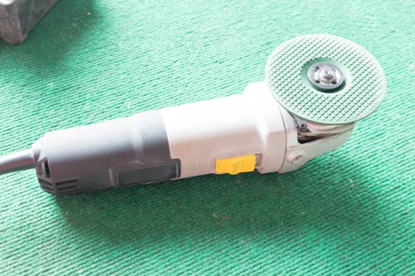 Angle Grinder with Cut-Off Wheel Angle Grinder with Cut-Off Wheel